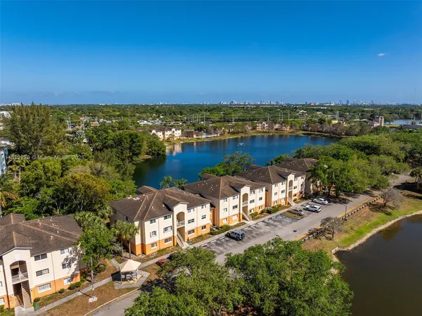 a view of a lake with a city