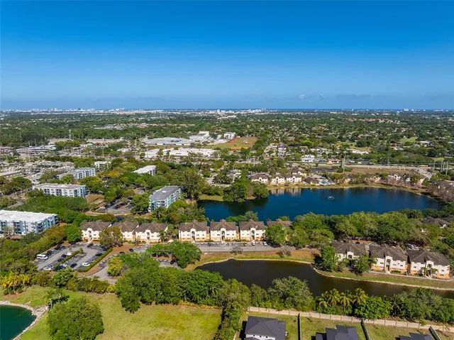 an aerial view of residential building and lake view