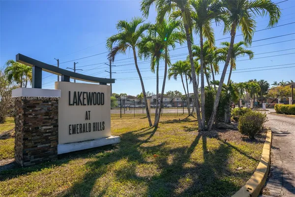 a house view with a swimming pool
