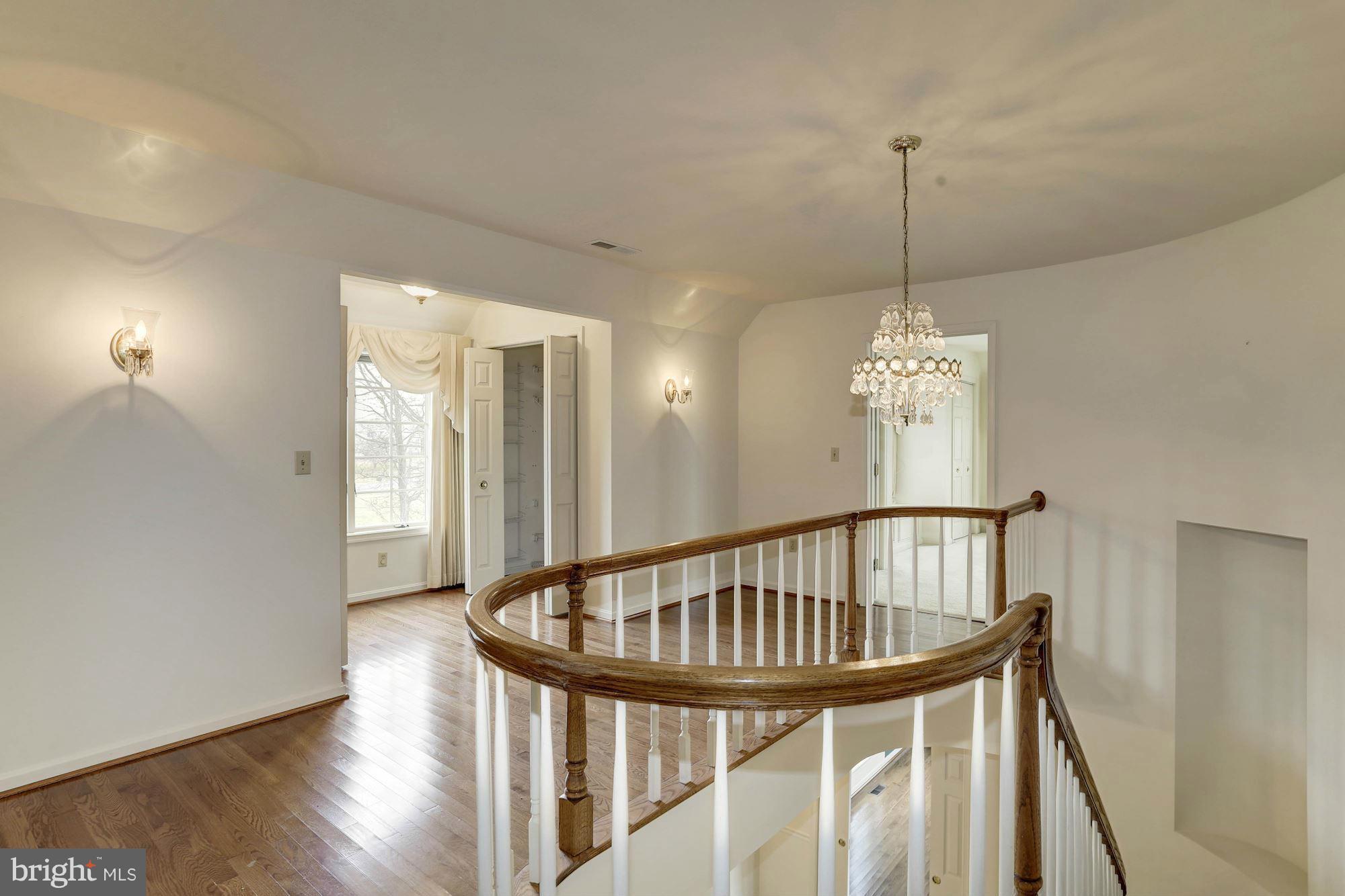 2848 Cox Neck Road Chester, MD 21619 - Photo 23 of 30 Stunning custom curved staircase