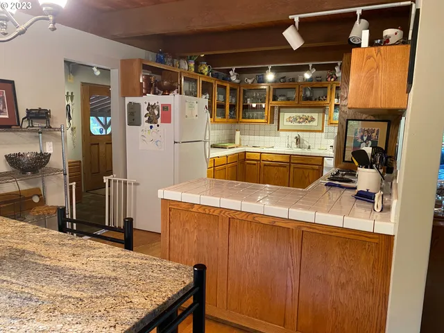 a storage room with washer and dryer