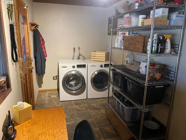 a utility room with dryer and washer