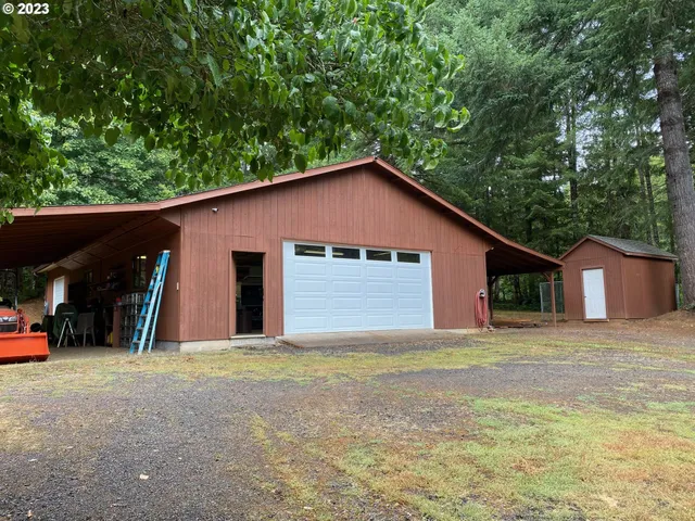 a house with trees in the background