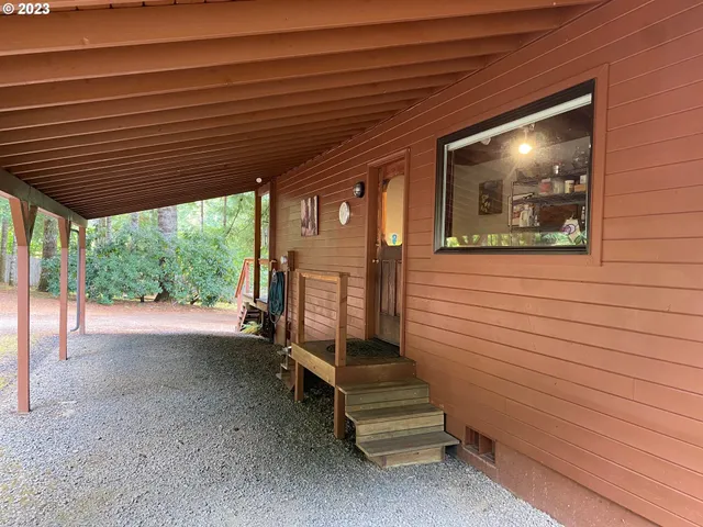 a view of a room with wooden walls and roof