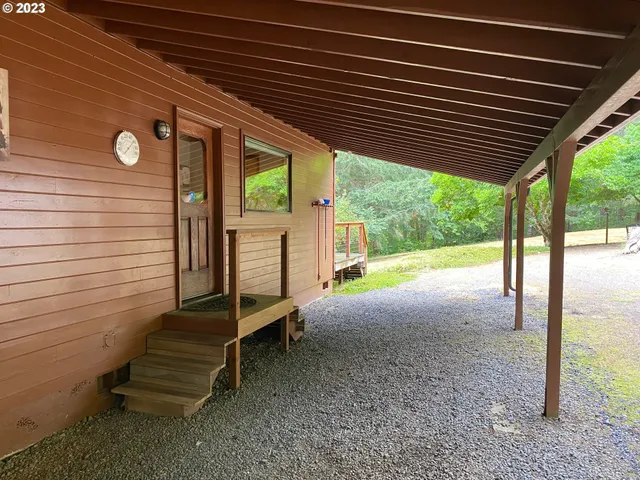 a view of backyard with deck