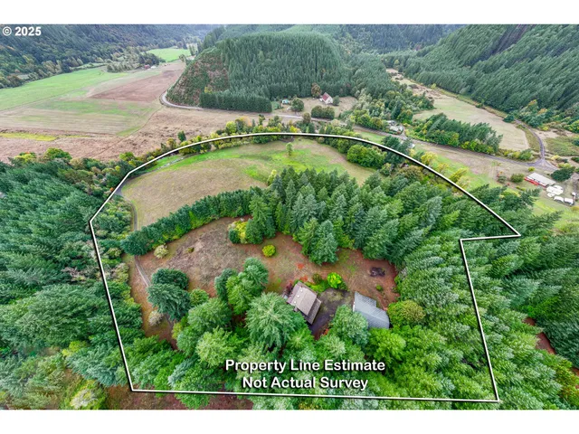 a view of a swimming pool with a yard and a lake view