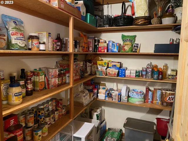 a room with lots of different colored cloths