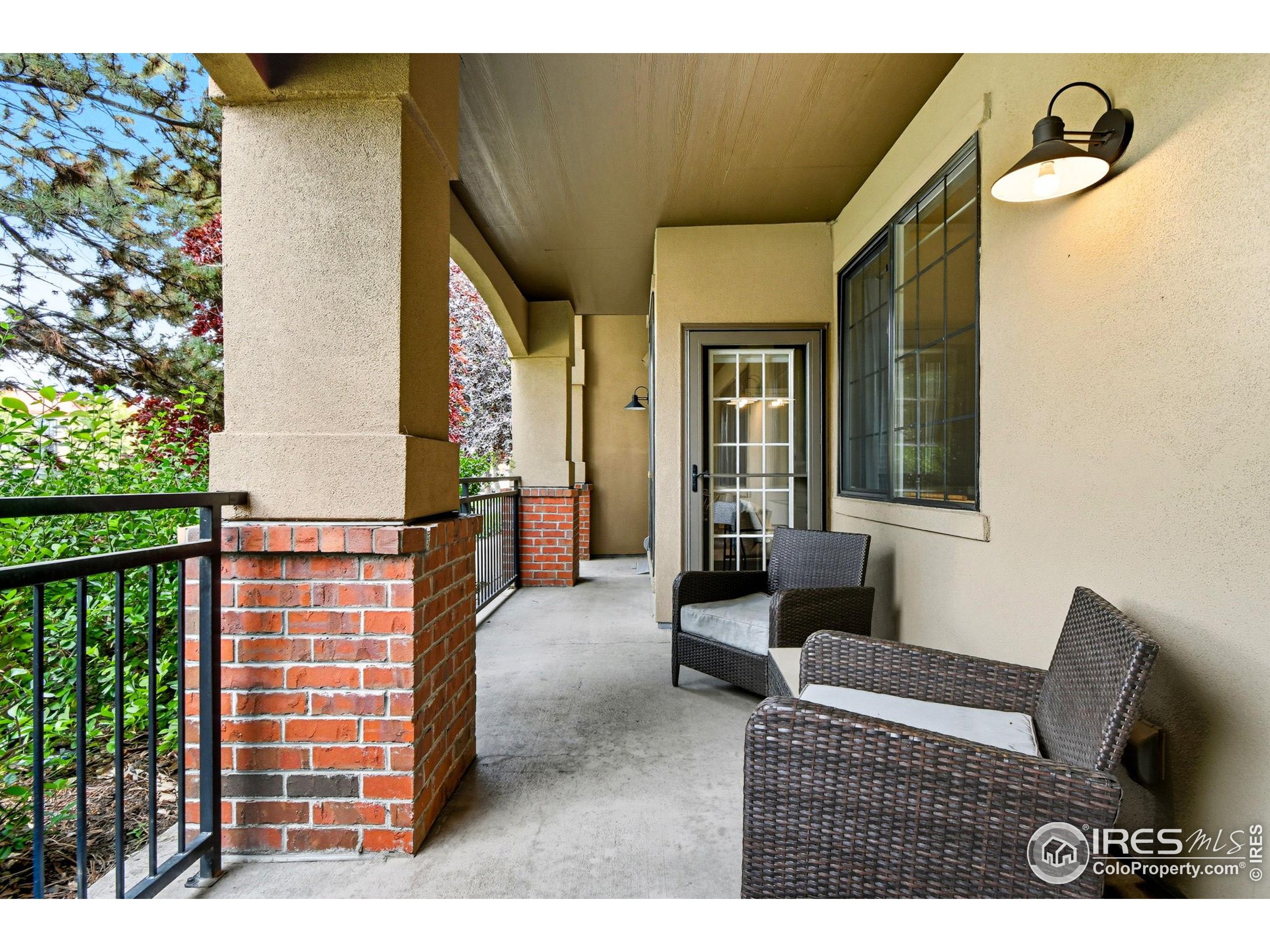159 Quebec Street, Unit D Denver, CO 80220 - Photo 2 of 49 a living room with furniture and a window