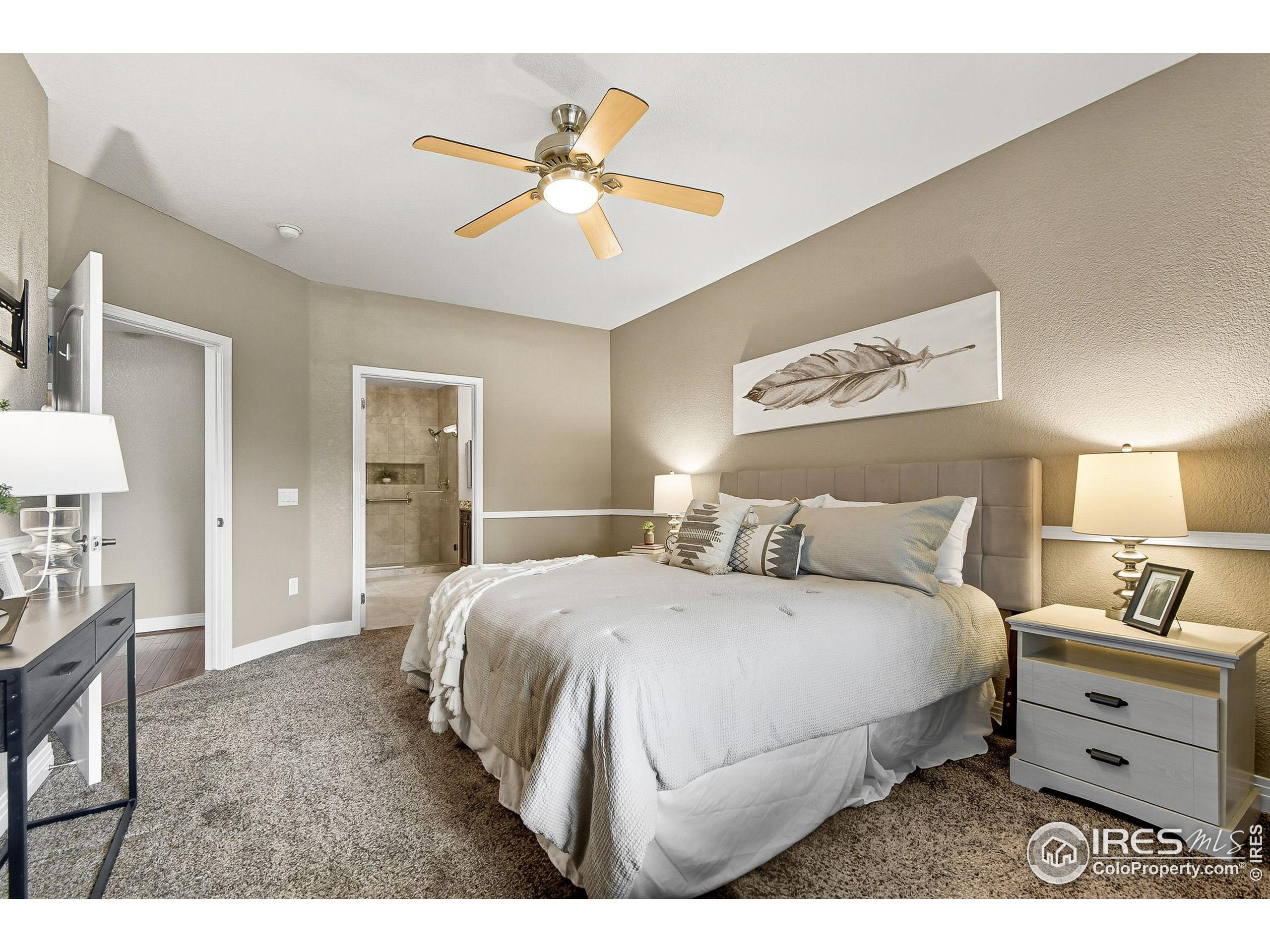 159 Quebec Street, Unit D Denver, CO 80220 - Photo 36 of 49 a bedroom with a bed and a chandelier