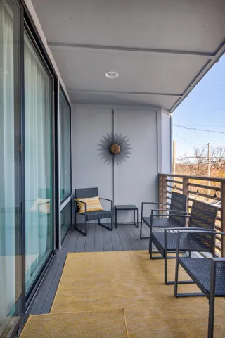 a living room with furniture and a table