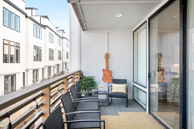 a view of a living room and entryway