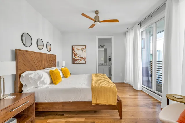 a bedroom with a bed and a couch