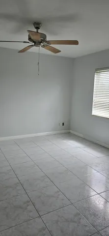 a view of a room with rack on the wall