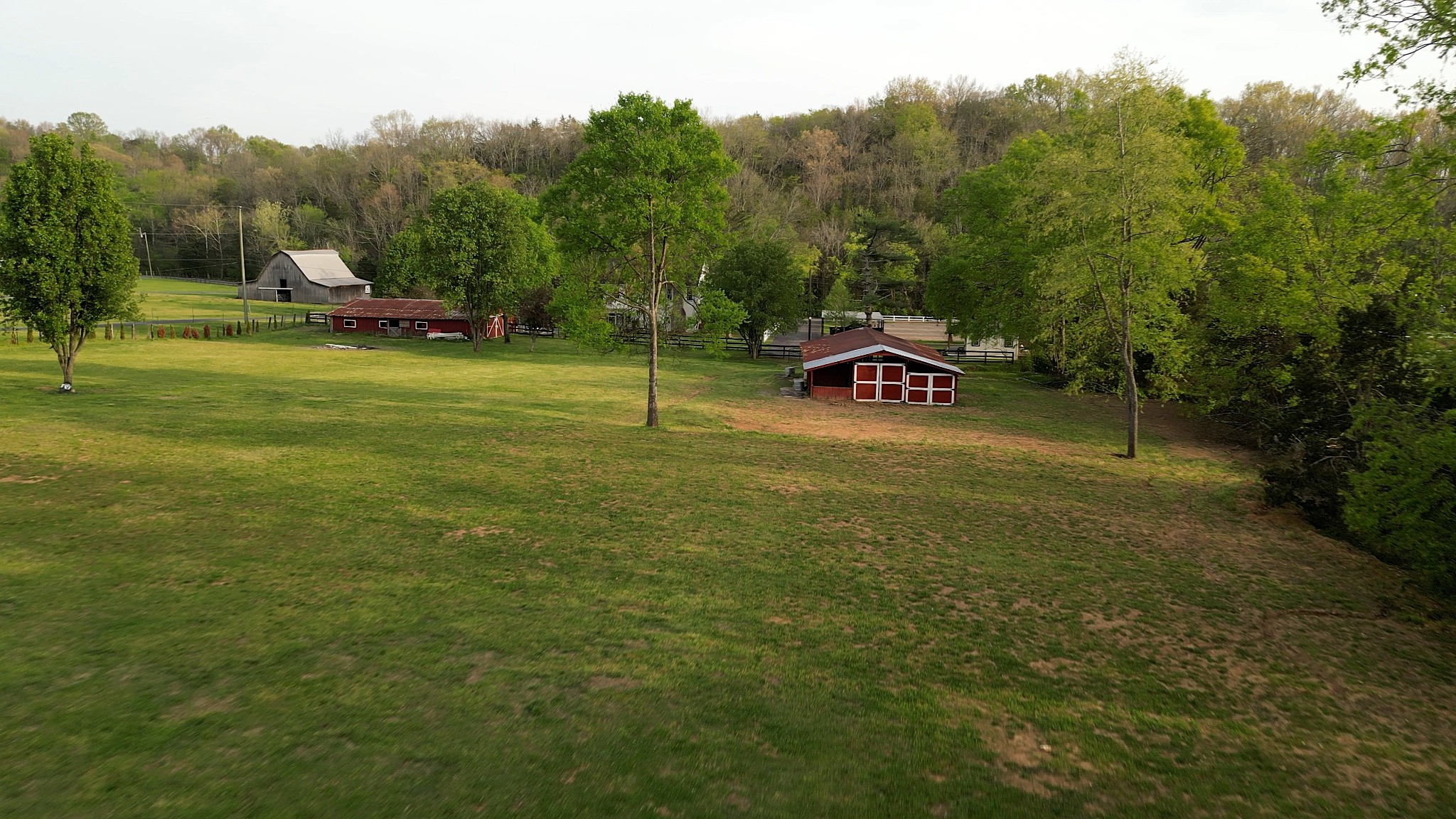 1199 Willis Branch Road Goodlettsville, TN 37072 - Photo 35 of 95 a backyard of a house with table and chairs