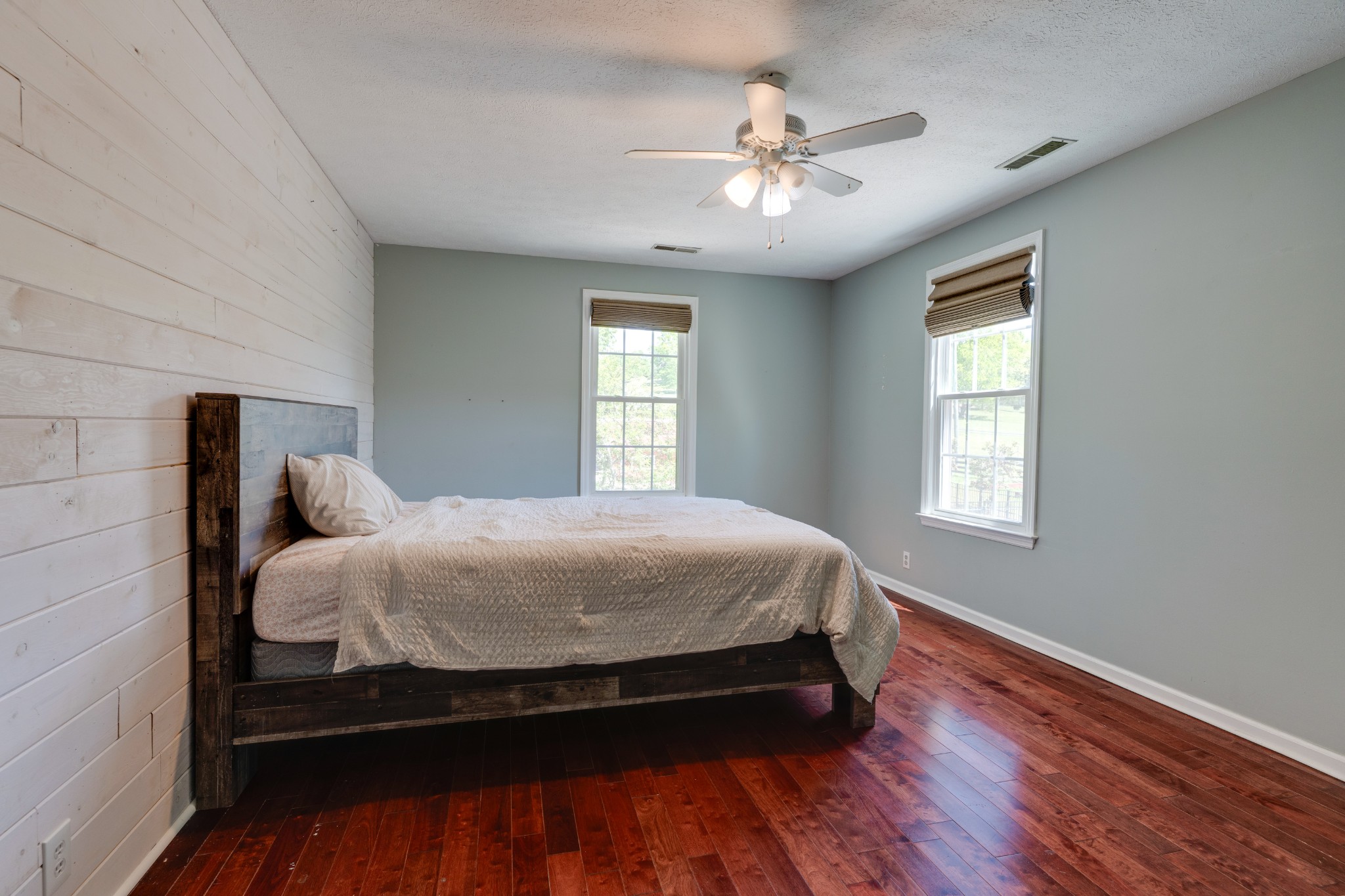 1199 Willis Branch Road Goodlettsville, TN 37072 - Photo 62 of 95 a bed sitting in a bedroom next to a window