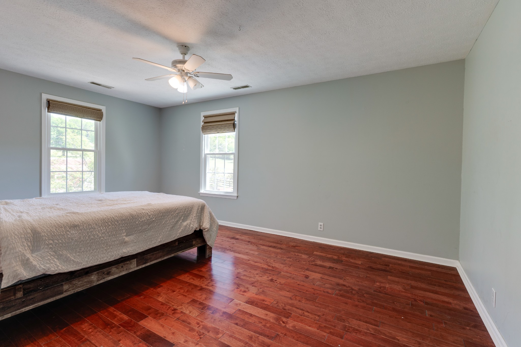 1199 Willis Branch Road Goodlettsville, TN 37072 - Photo 63 of 95 a spacious bedroom with a bed and a window