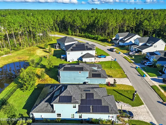 a view of an outdoor space pool patio and ocean view