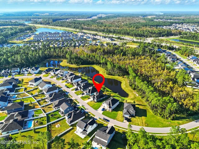 a view of a swimming pool with a chairs
