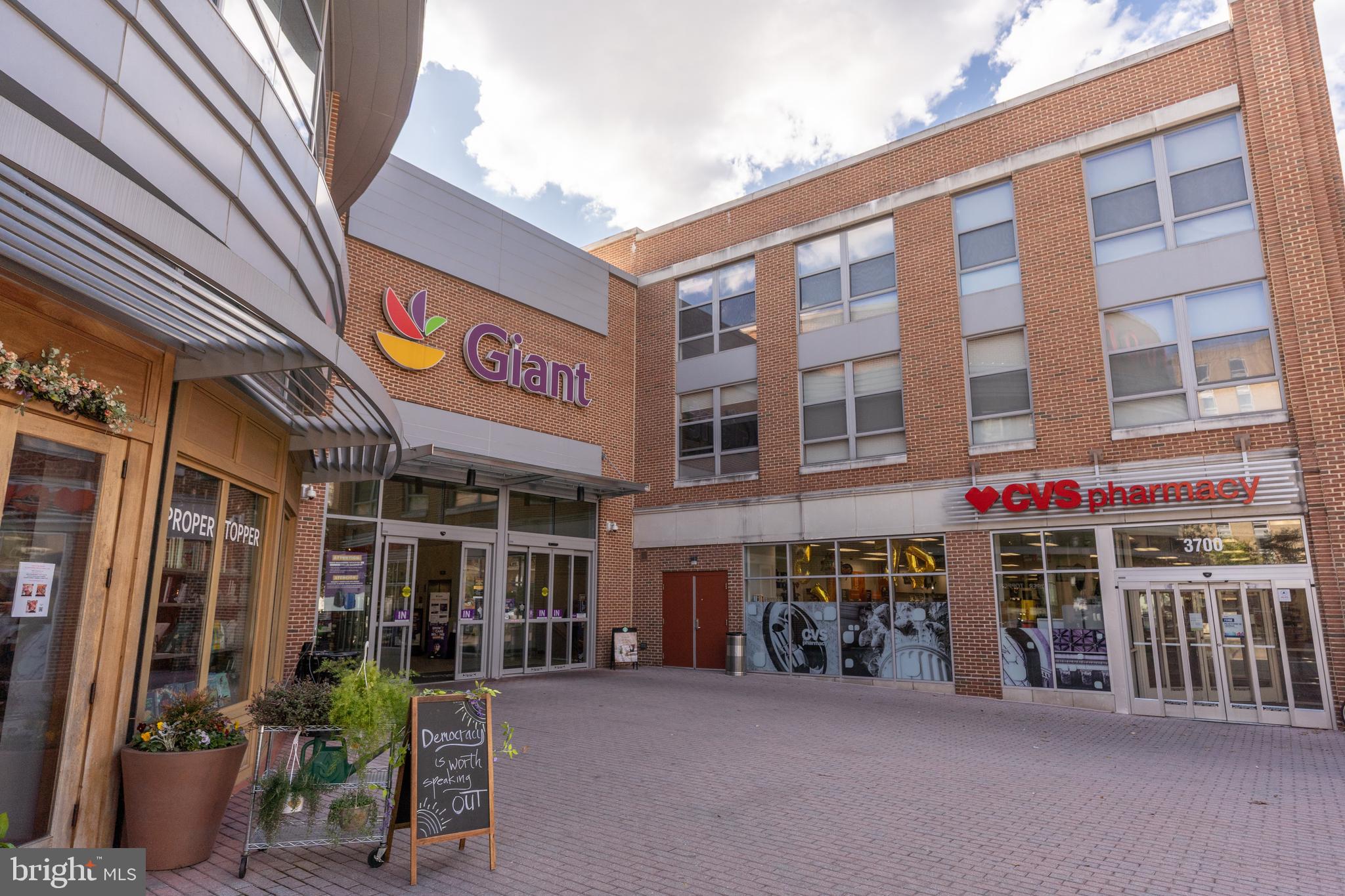 3806 Porter Street Northwest, Unit 101 Washington, DC 20016 - Photo 26 of 31 a view of a building with sitting area