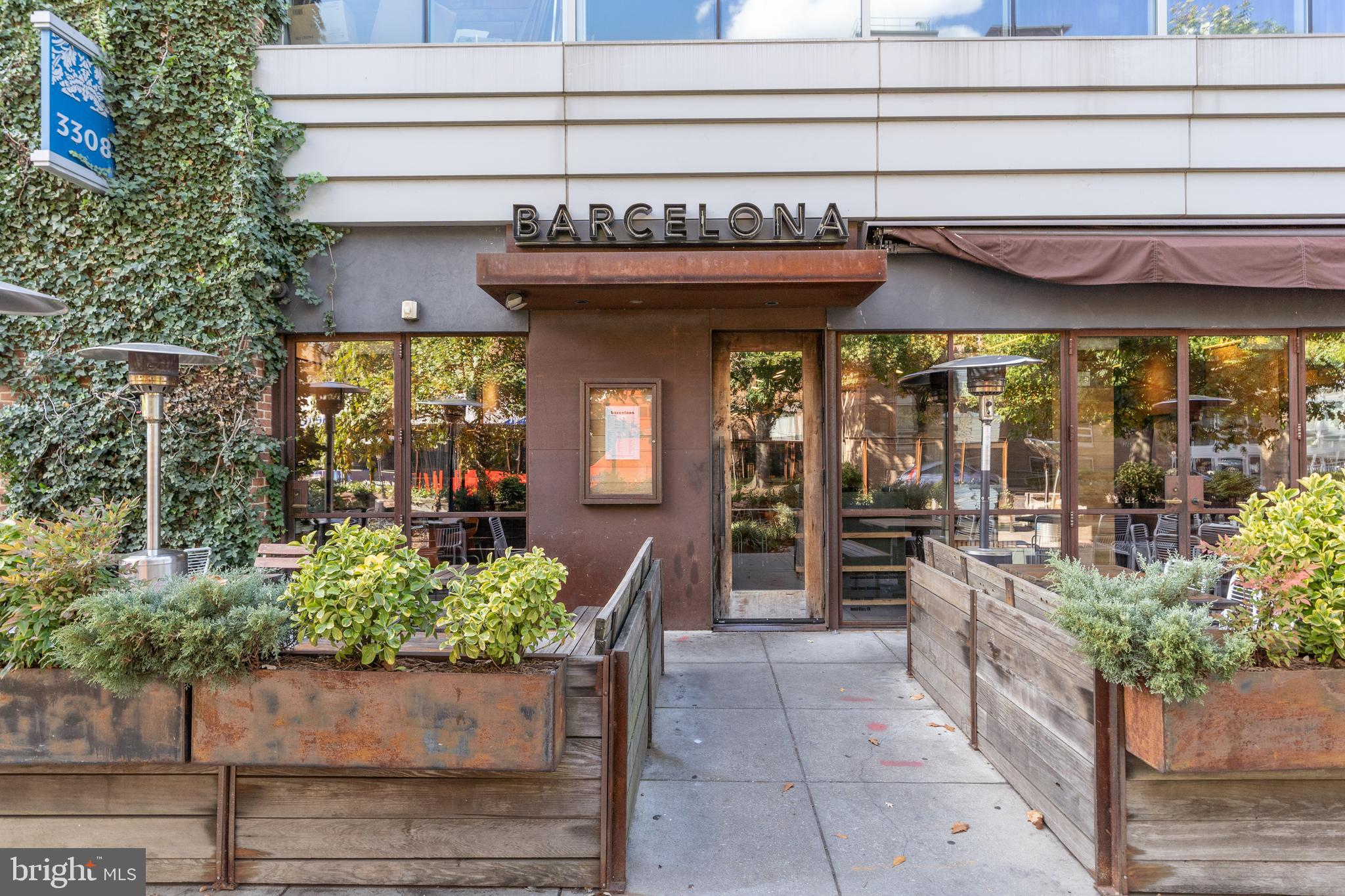 3806 Porter Street Northwest, Unit 101 Washington, DC 20016 - Photo 28 of 31 a front view of a retail shops
