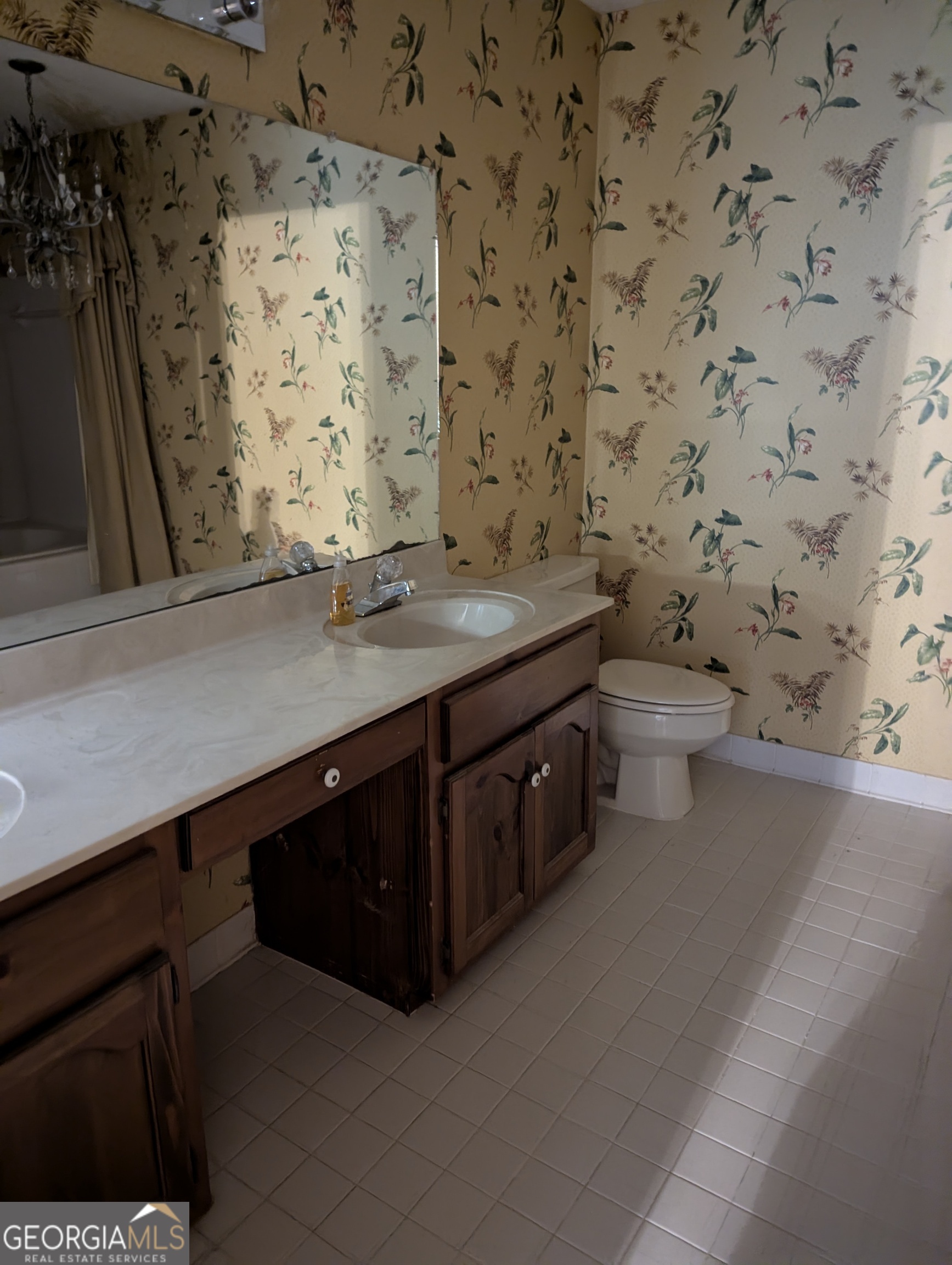 6111 Peake Road Macon, GA 31220 - Photo 14 of 21 a bathroom with a sink and a toilet