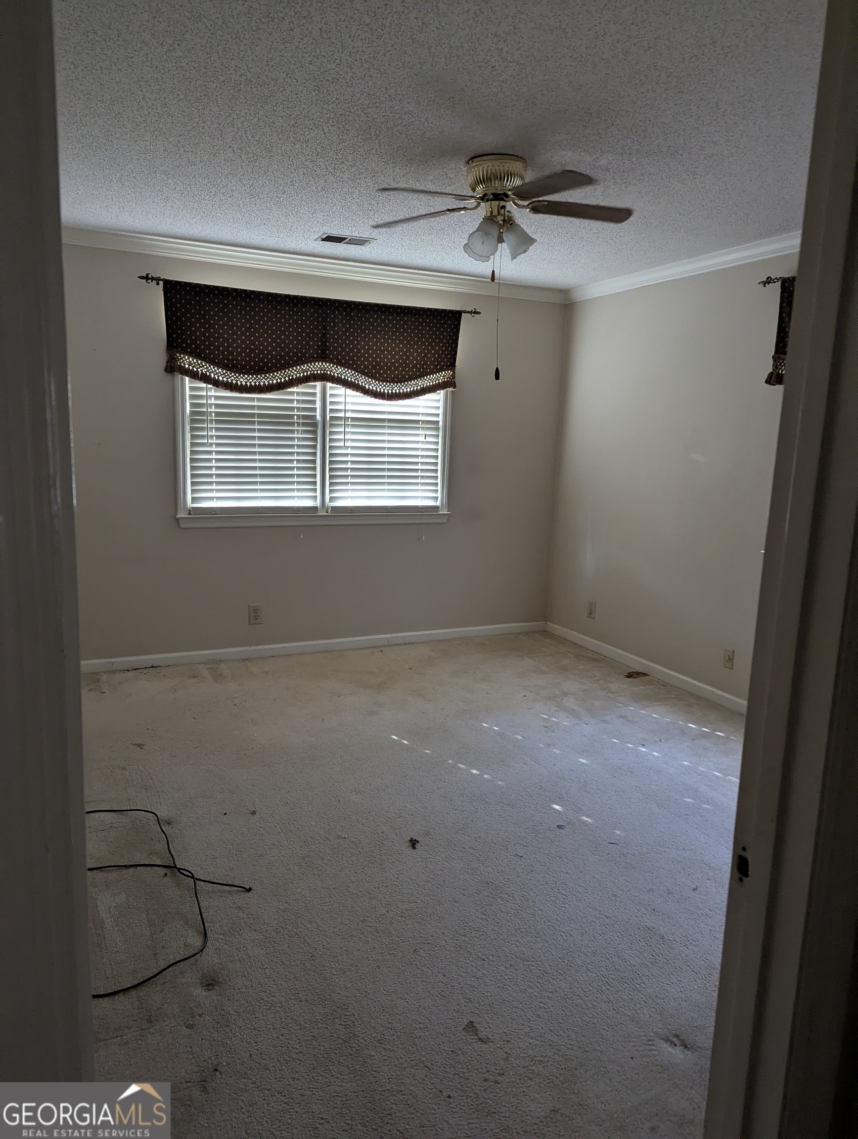 6111 Peake Road Macon, GA 31220 - Photo 10 of 21 a view of a room with rack on the wall