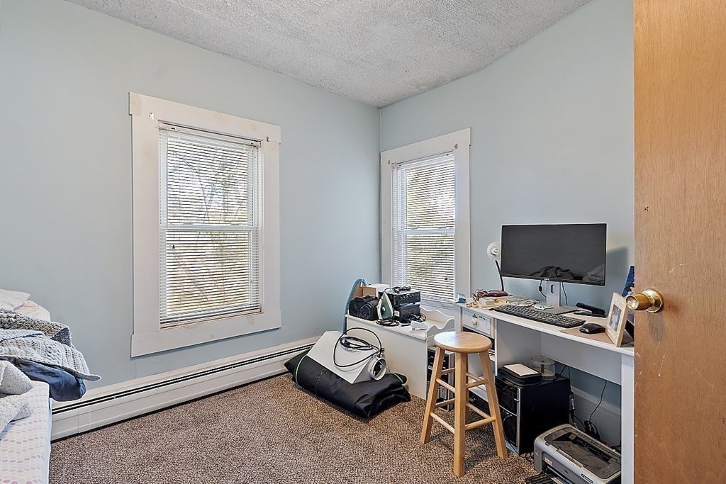 11 Autumn Street Lowell, MA 01852 - Photo 25 of 35 a room with furniture and a window