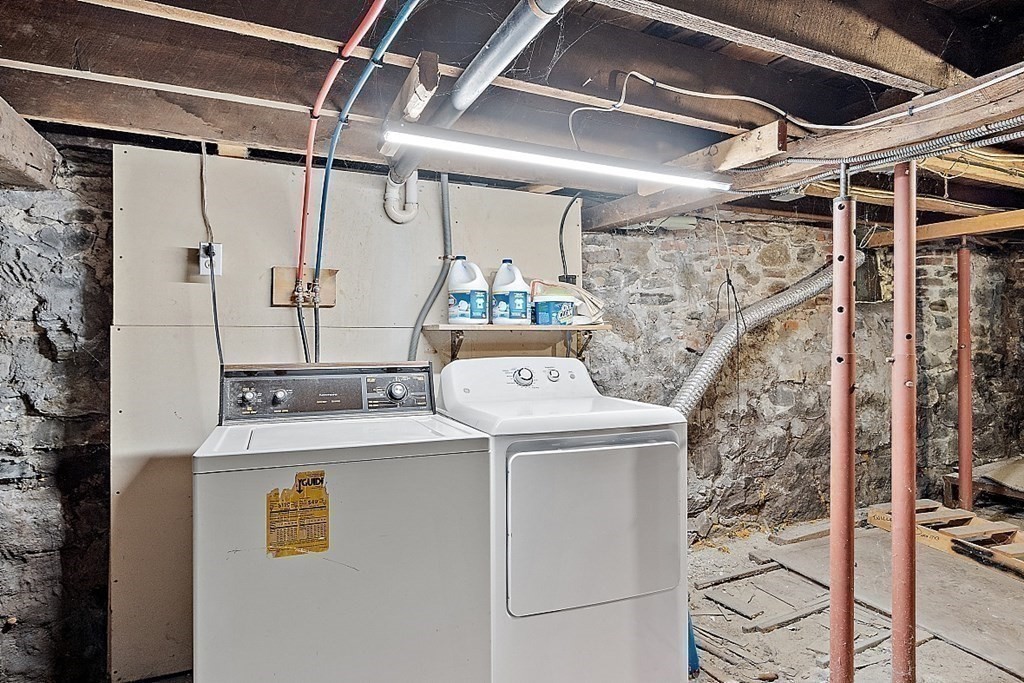 11 Autumn Street Lowell, MA 01852 - Photo 31 of 35 a utility room with dryer and washer