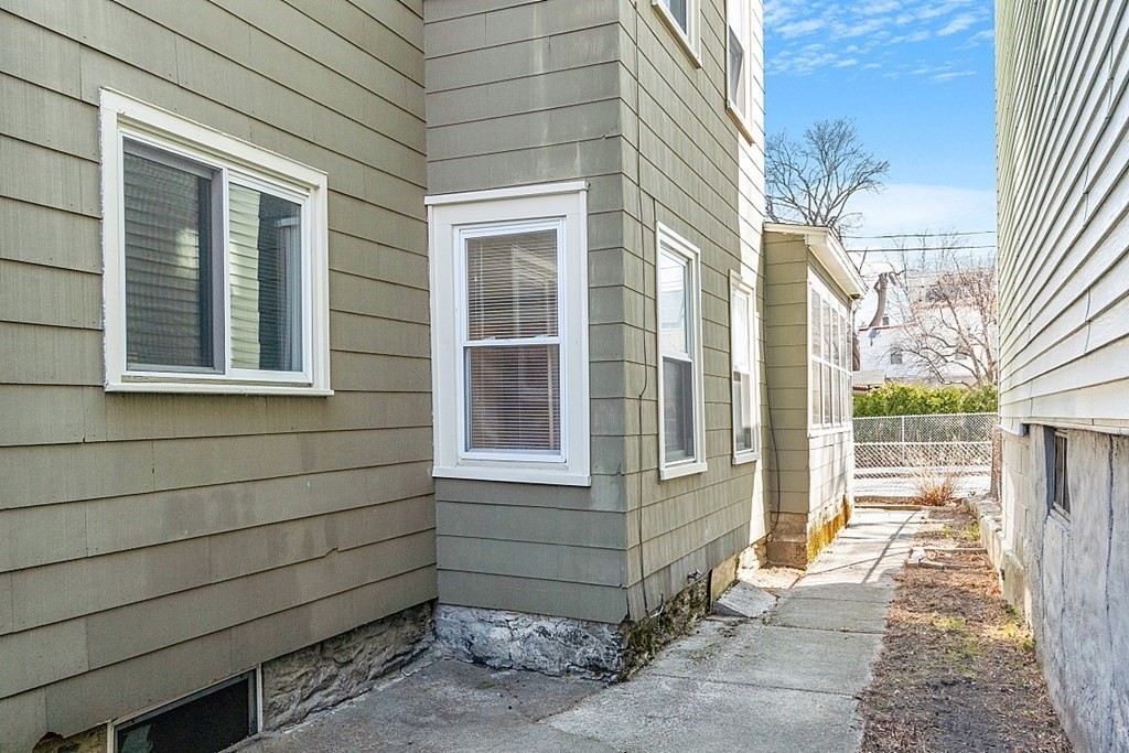 11 Autumn Street Lowell, MA 01852 - Photo 32 of 35 a view of a house with a large window