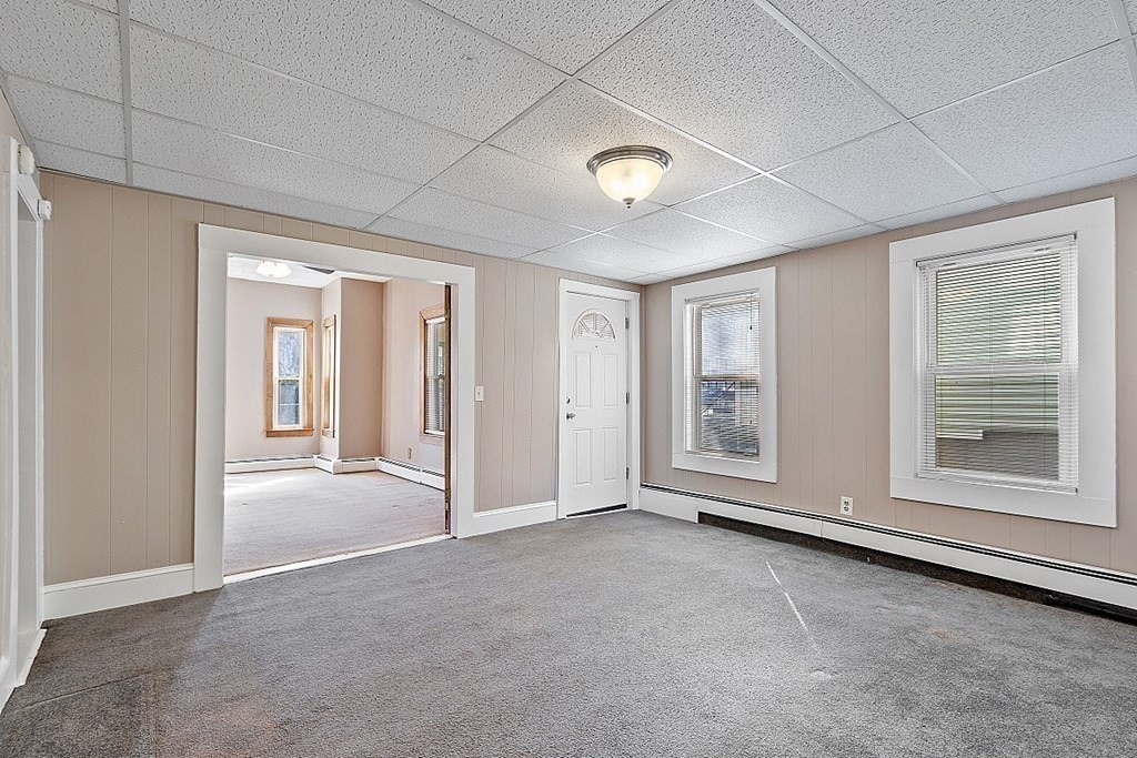 11 Autumn Street Lowell, MA 01852 - Photo 5 of 35 an empty room with windows