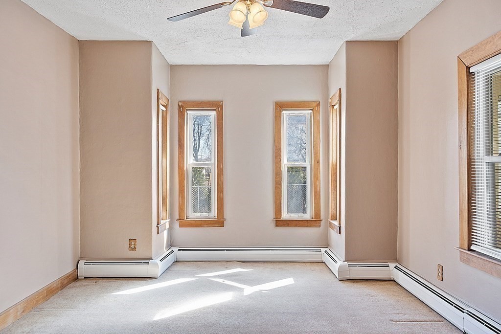 11 Autumn Street Lowell, MA 01852 - Photo 7 of 35 an empty room with windows