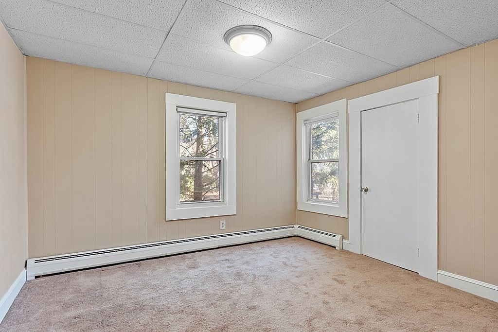 11 Autumn Street Lowell, MA 01852 - Photo 10 of 35 a view of an empty room with a window