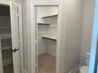 a bathroom with a glass door