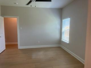 1201 Witherspoon Lane Princeton, TX 75407 - Photo 12 of 15 an empty room with windows