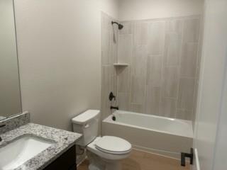 1201 Witherspoon Lane Princeton, TX 75407 - Photo 7 of 15 a bathroom with a granite countertop bathtub shower sink vanity and toilet