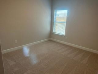 1201 Witherspoon Lane Princeton, TX 75407 - Photo 8 of 15 an empty room with a window