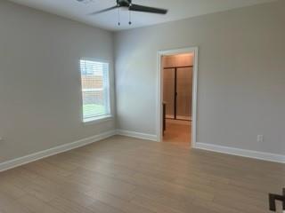 1201 Witherspoon Lane Princeton, TX 75407 - Photo 9 of 15 an empty room with windows and closet