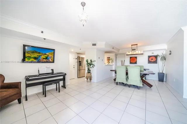 a living room with furniture and a piano