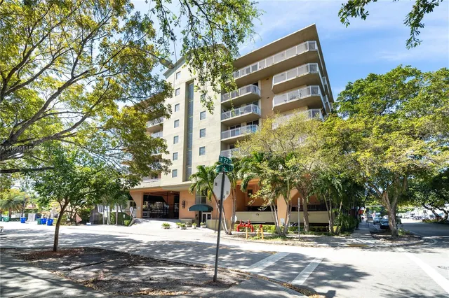 a front view of a building with street view