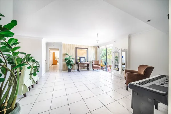 a living room with patio furniture