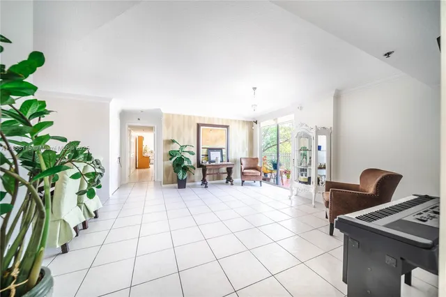 a living room with patio furniture