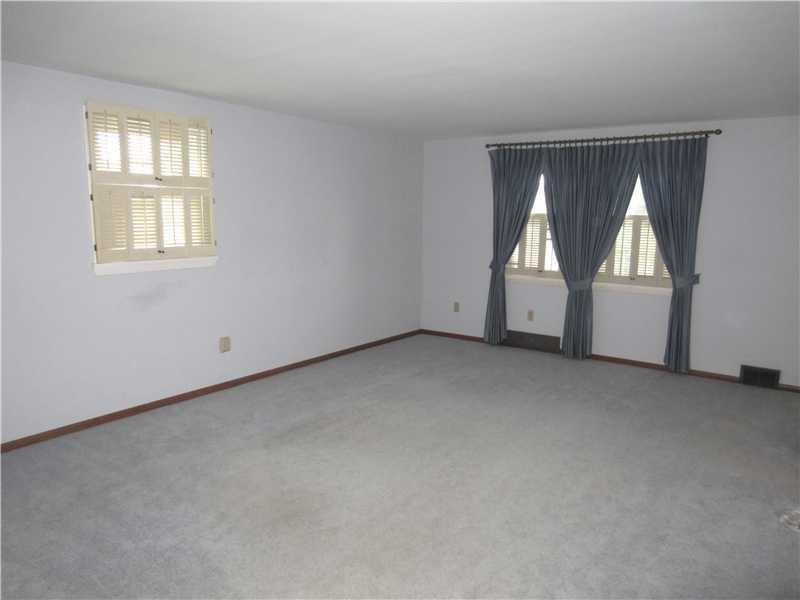 1002 Harvard Road Monroeville, PA 15146 - Photo 14 of 25 Family Room. A Large First Floor Family Room with Plantation Shutters gives you tons of living space.