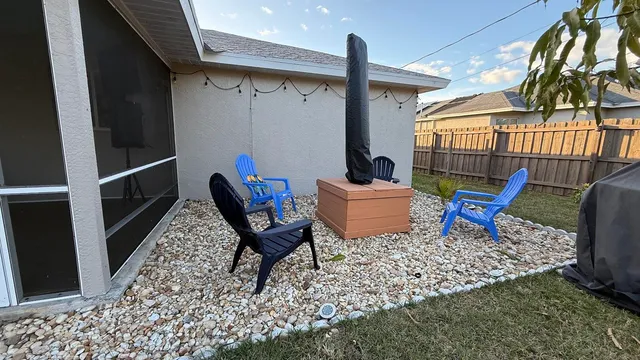 a view of a chairs in patio