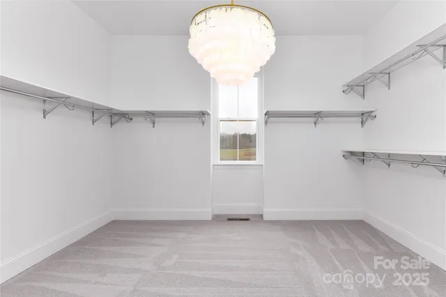 a view of a room with racks on the wall