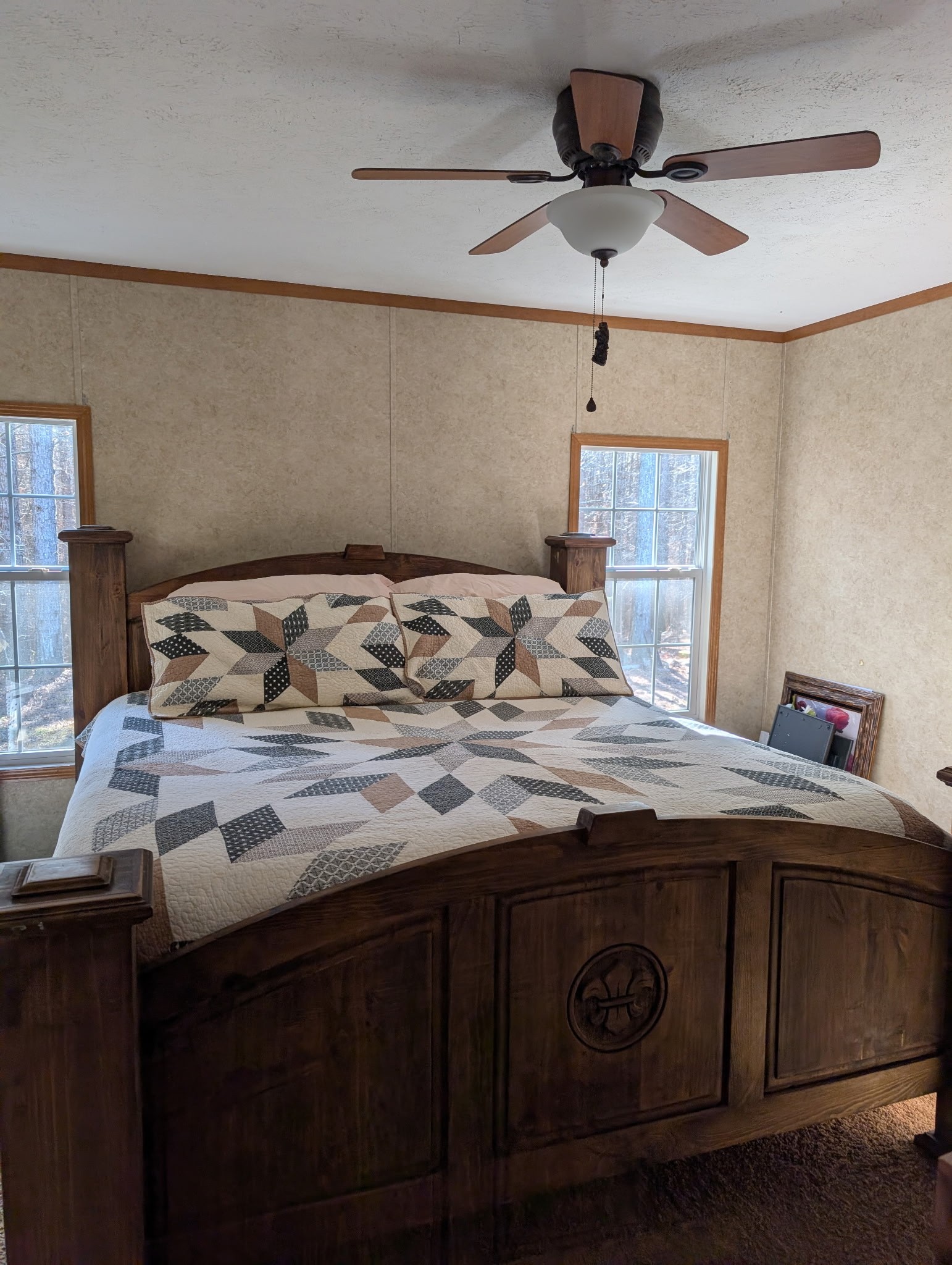 1239 Bald Knob Road Holladay, TN 38341 - Photo 16 of 25 a bedroom with a bed and a chandelier