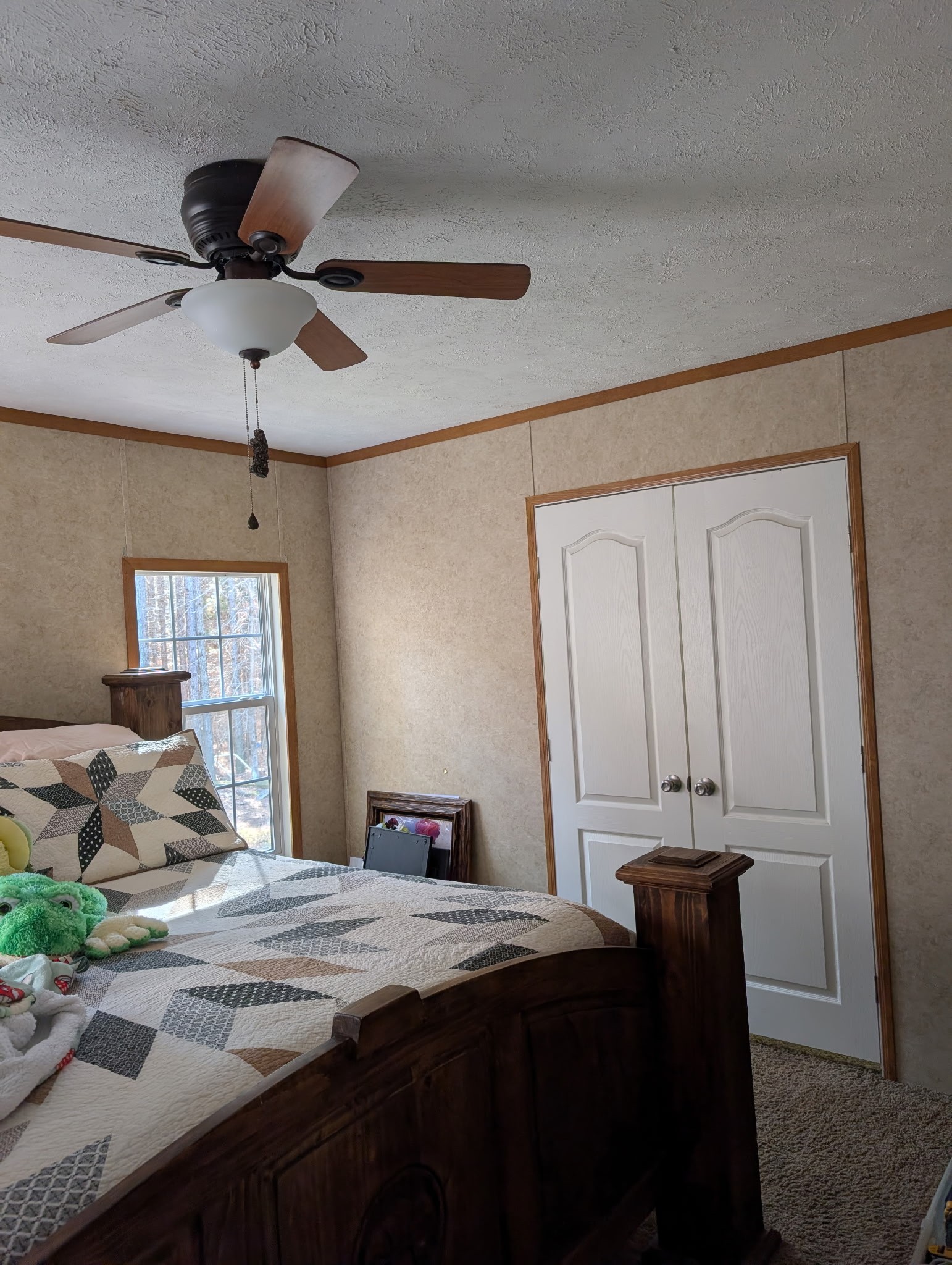 1239 Bald Knob Road Holladay, TN 38341 - Photo 18 of 25 a bedroom with a bed and a dresser