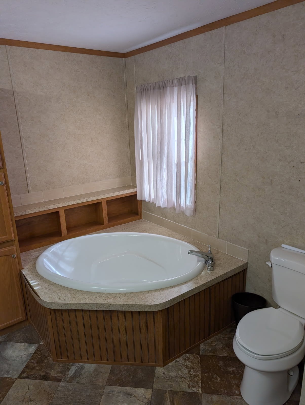 1239 Bald Knob Road Holladay, TN 38341 - Photo 23 of 25 a bathroom with a sink and a toilet