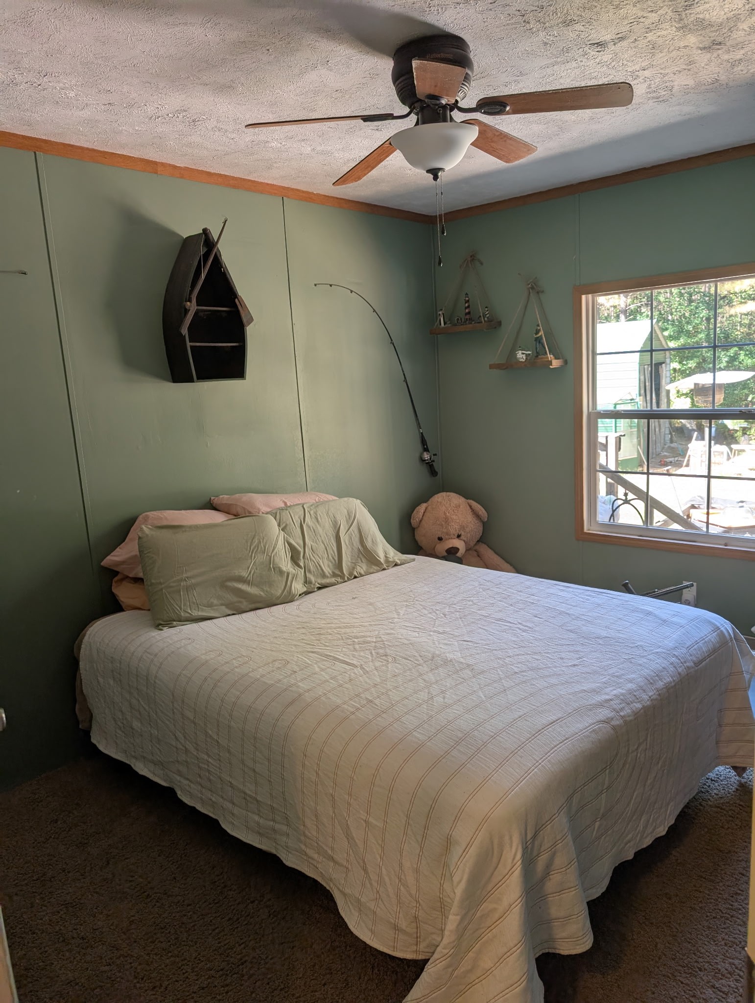 1239 Bald Knob Road Holladay, TN 38341 - Photo 25 of 25 a bedroom with a bed and a chandelier