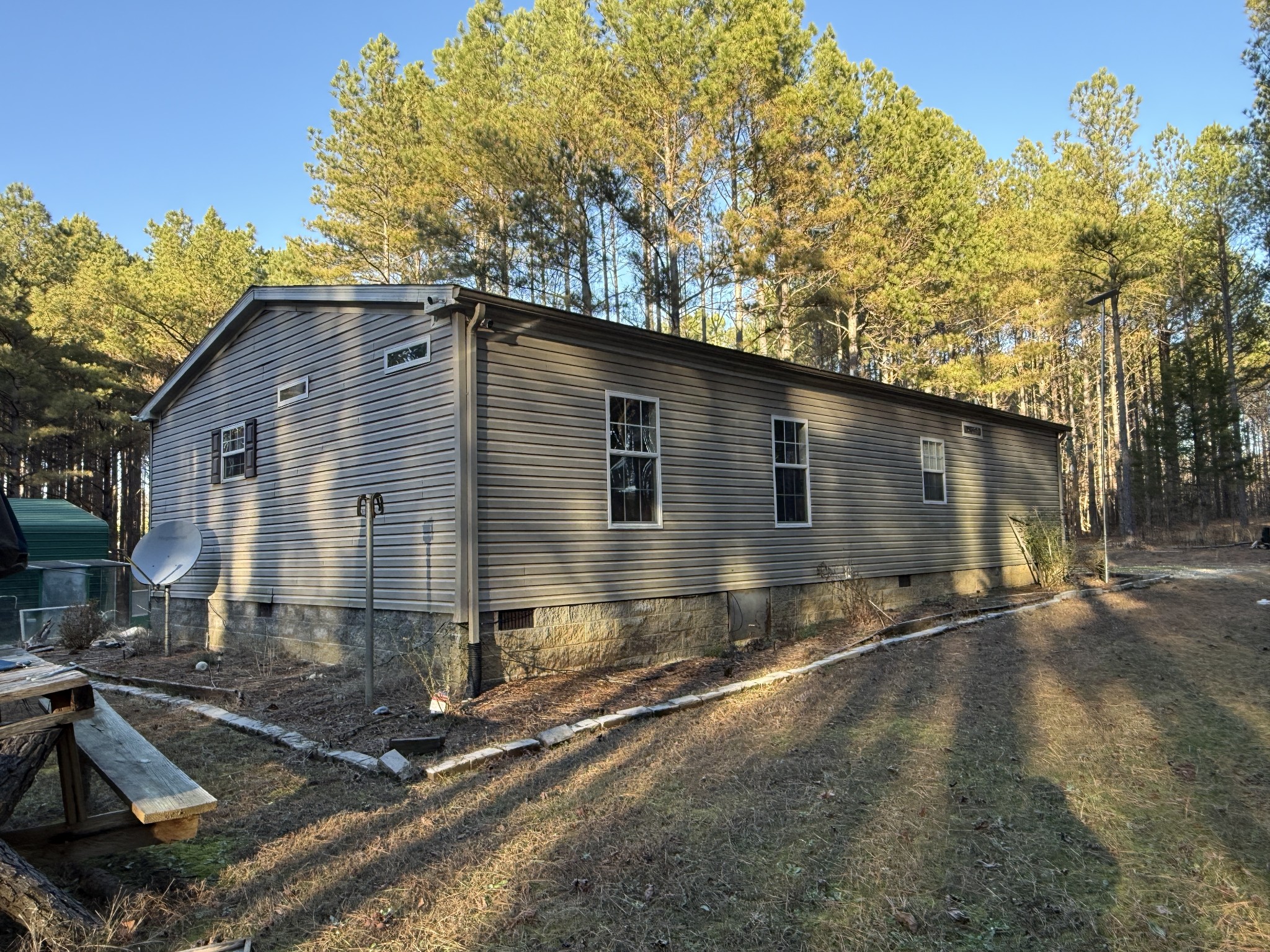 1239 Bald Knob Road Holladay, TN 38341 - Photo 3 of 25 a front view of a house with yard