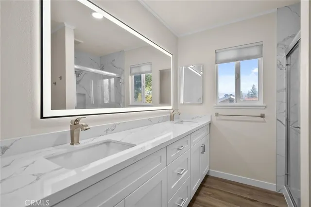 a bathroom with a sink and a window